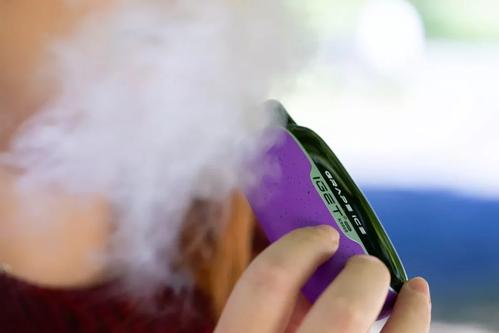 Internal components of a disposable vape showing battery and sensor